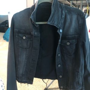 Black jean jacket, stretch material.